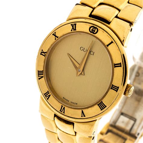 gold gucci watch